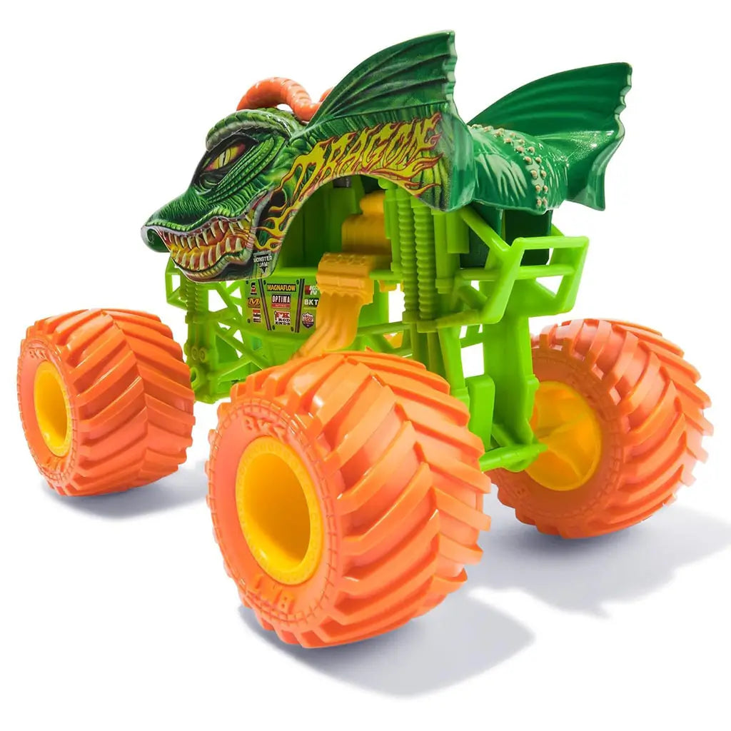 Rear angled view of Monster Jam Dragon diecast truck highlights neon green chassis, bold dragon body graphics, orange spiked horns, and oversized bright orange treaded wheels.