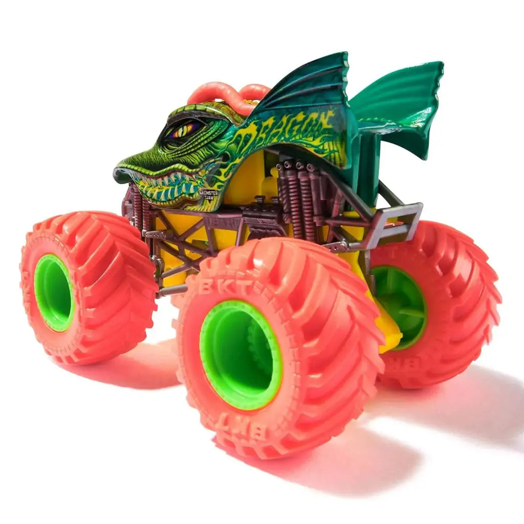 Rear angled view of Monster Jam Dragon diecast truck at 1:64 scale, featuring detailed dragon artwork, bright red treaded wheels, and yellow-green chassis details.