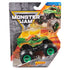 Monster Jam Dragon toy truck in vivid green with sculpted scale details and orange horns, sealed in clear blister packaging against a fiery arena backdrop that highlights its dramatic legacy-truck theme.
