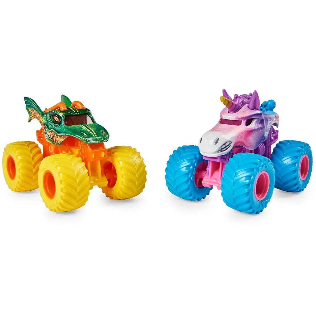 Monster Jam toy trucks in green, orange, purple, and blue molded plastic with chunky treaded wheels shaped as dragon and unicorn characters designed for play on a clean white background.
