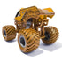 Rear angled view of Monster Jam Earth Shaker diecast truck highlights bold yellow cracked rock paint, large sculpted dirt bed, thick tread wheels, and authentic suspension build.