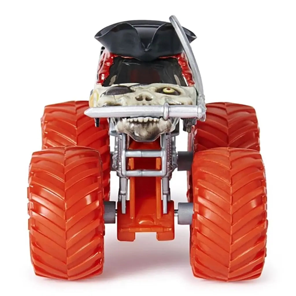 Monster Jam Pirate’s Curse truck in black with pirate hat, skull face grille, and large orange tires, viewed from the front to highlight its fierce themed design.