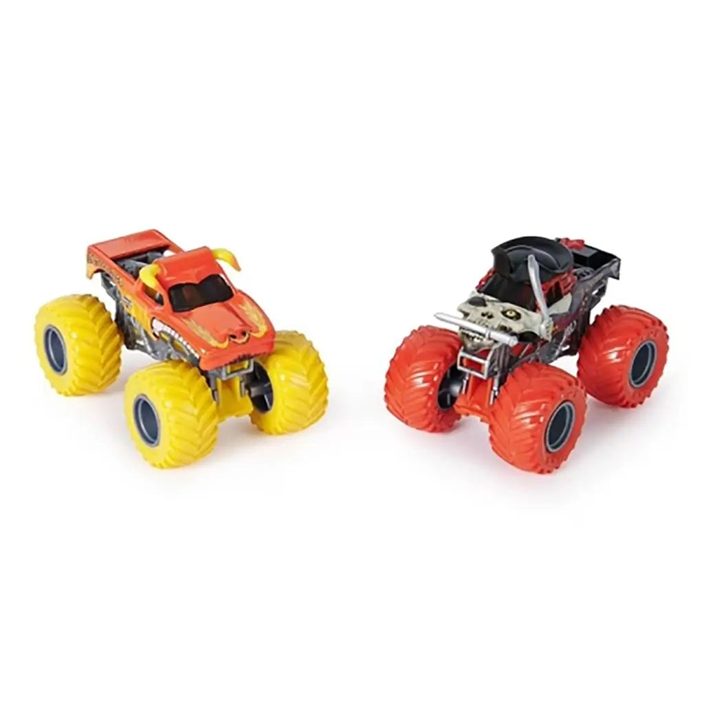 Set of two Monster Jam toy trucks, El Toro Loco in red with yellow horns and Pirate’s Curse in black with a skull face, displayed side by side with bold colored tires.