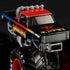 Close-up of Monster Jam Excaliber 1:64 diecast truck, featuring black body with rainbow gradient graphics, red roof, and oversized tread tires with red rims.