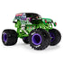 Monster Jam Grave Digger diecast truck features green chassis, black body with eerie skull graphics, chrome exhaust pipes, and oversized black BKT tires with bold purple hubs on a white studio background.