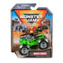 Monster Jam Grave Digger 1:64 diecast truck in retail package, showcasing black and green design with flaming hood, skull artwork, and event-themed background graphics.