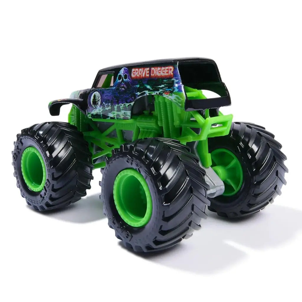 Monster Jam Grave Digger Legacy 1:64 scale monster truck rear view with neon green chassis, oversized black tires with green rims, and spooky haunted graveyard graphics.