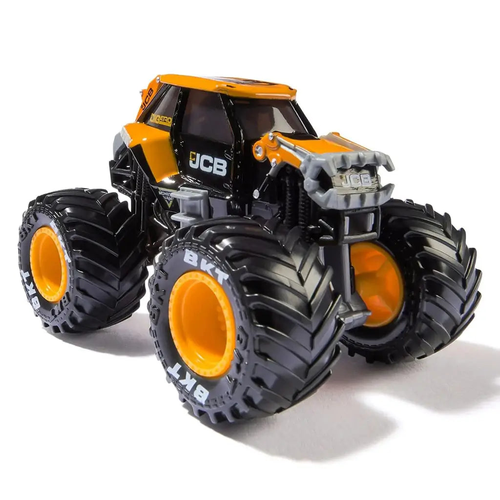 Angled front view of Monster Jam JCB Digatron diecast truck at 1:64 scale, showcasing bright orange cab, heavy-duty chassis, and oversized rugged black tires.