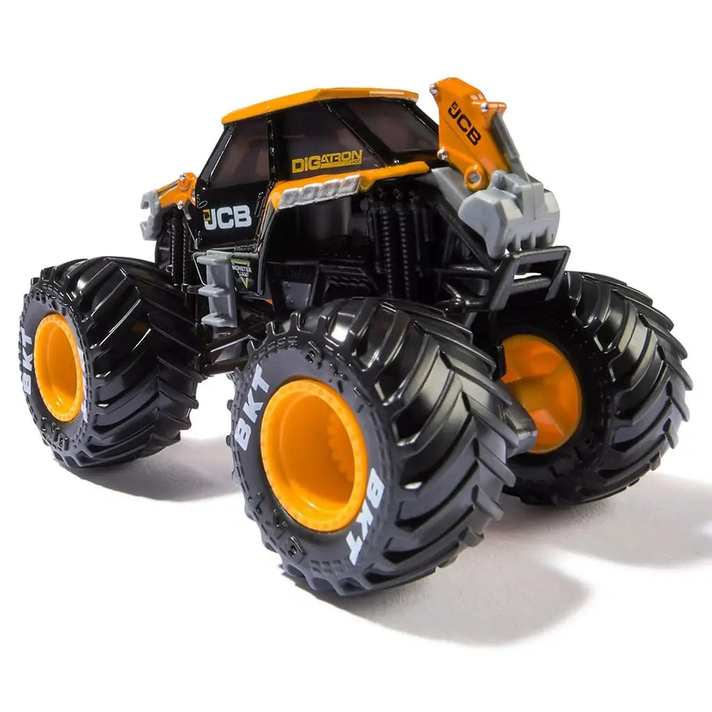 Angled rear view of Monster Jam JCB Digatron 1:64 scale diecast truck, with orange roof, black body, silver detailing, and large BKT tires with yellow hubs.