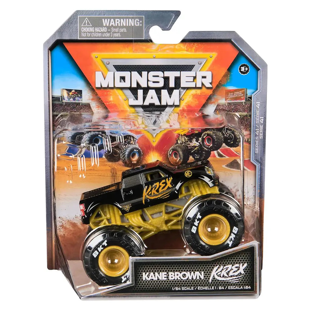Monster Jam Kane Brown K-Rex 1:64 scale diecast truck packaged in fiery stadium-themed box, with black and gold body design and BKT-branded monster tires.