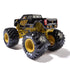Rear view of Monster Jam Kane Brown K-Rex 1:64 scale truck, showing black pickup-style body, orange Monster Jam logo, gold chassis, and oversized black wheels.