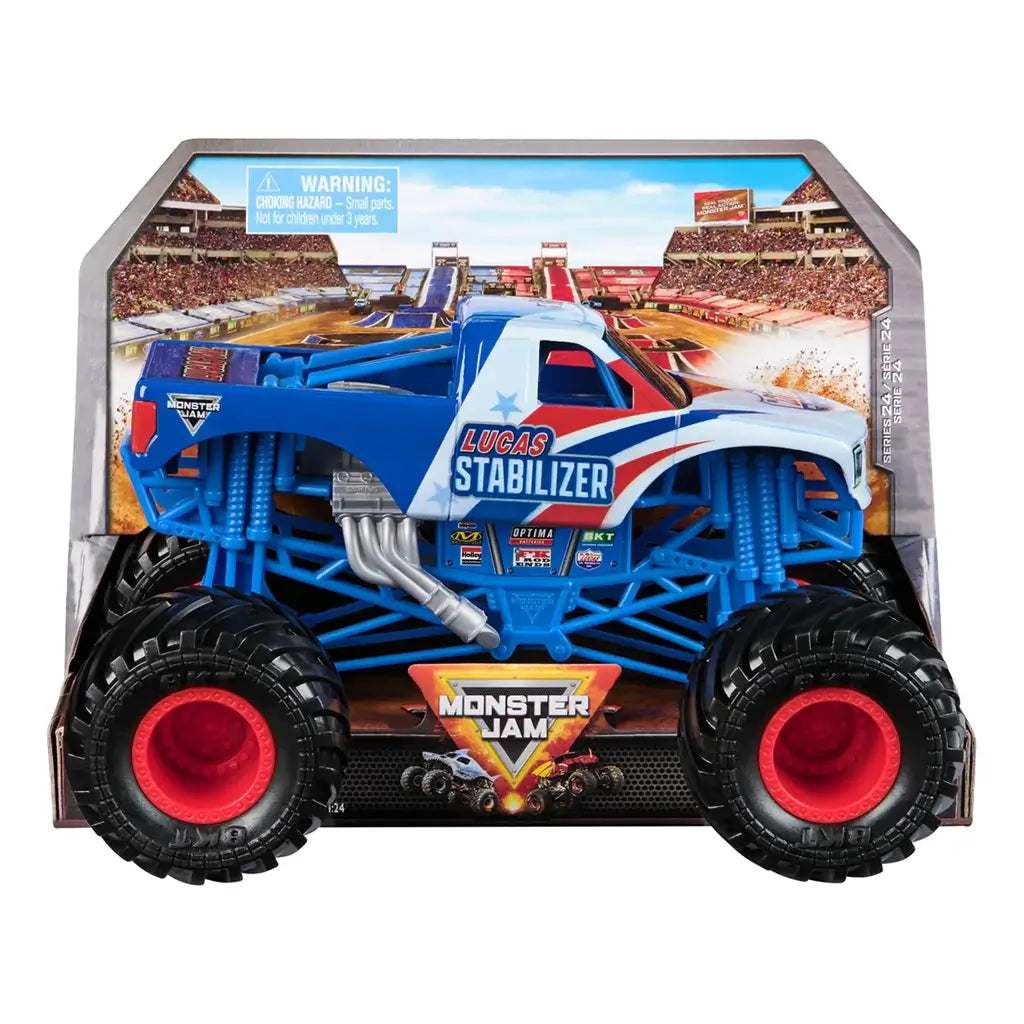Monster Jam Lucas Stabilizer 1:24 scale diecast truck packaging displays the blue-and-white vehicle with red accents in a stadium-themed box highlighting official branding and massive black BKT tires.