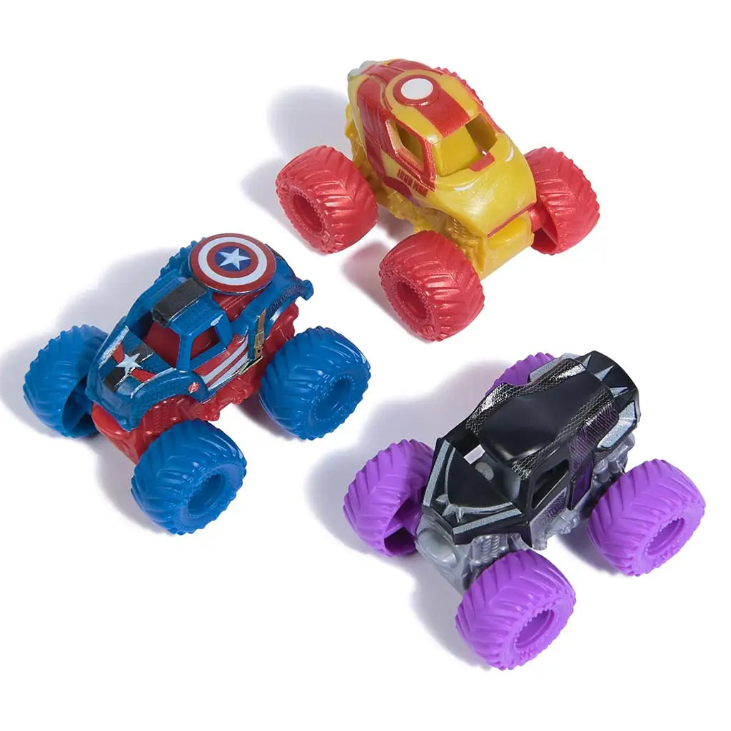 Three Marvel Monster Jam 1:87 scale trucks featuring Captain America, Black Panther, and Iron Man, arranged together, highlighting colorful wheels and superhero-themed bodies.