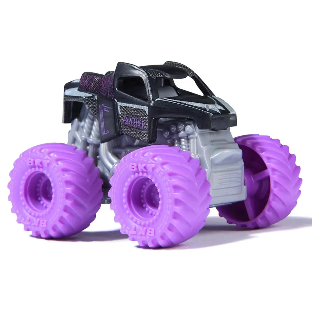 Side view of Monster Jam Marvel Black Panther mini monster truck with black and silver body, purple oversized tires, and detailed trim from 1:87 scale set.