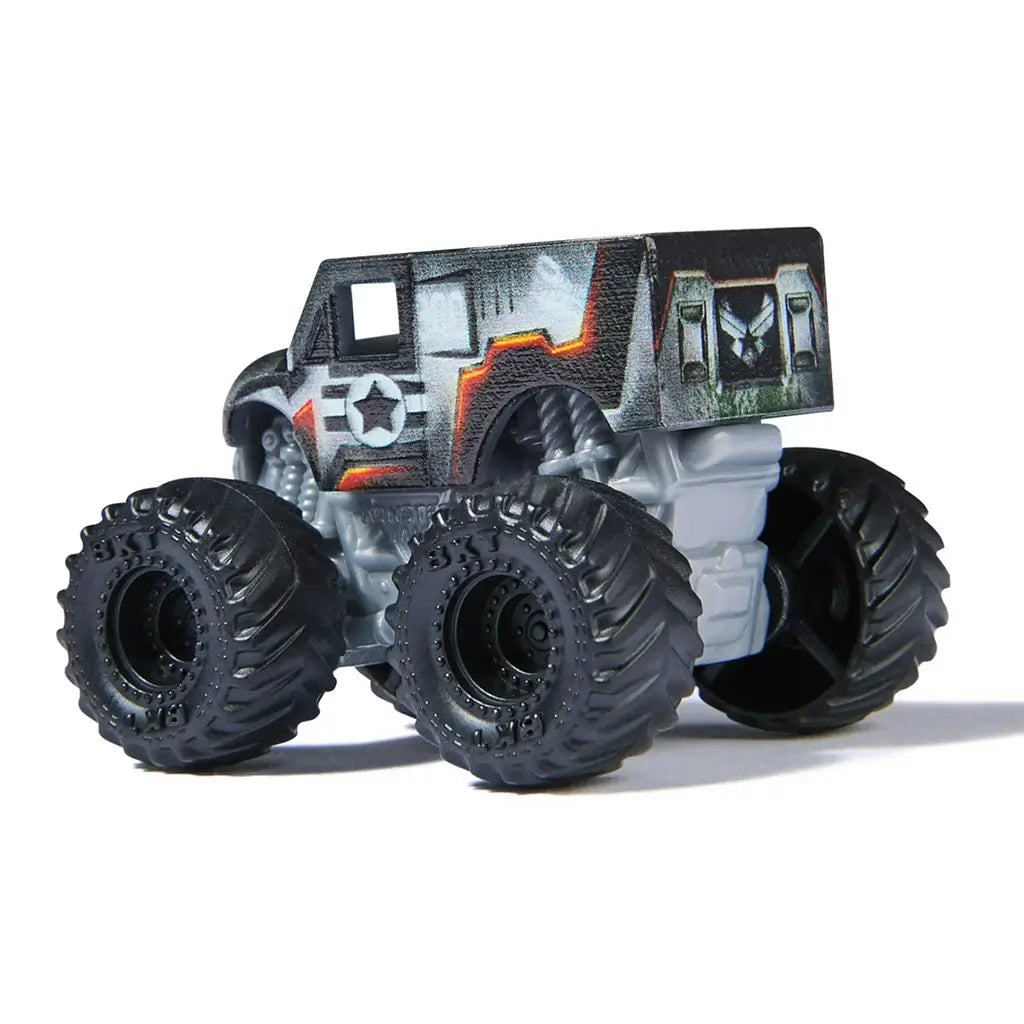 Marvel War Machine mini Monster Jam truck in 1:87 scale, gray and black body with red-orange trim and black wheels, rear angled view showcasing superhero armored styling.