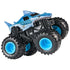 Shark-themed blue Monster Jam Megalodon toy truck with smooth curved body, black oversized tires and bright blue hubs, captured in a dynamic angled pose on a clean white background.