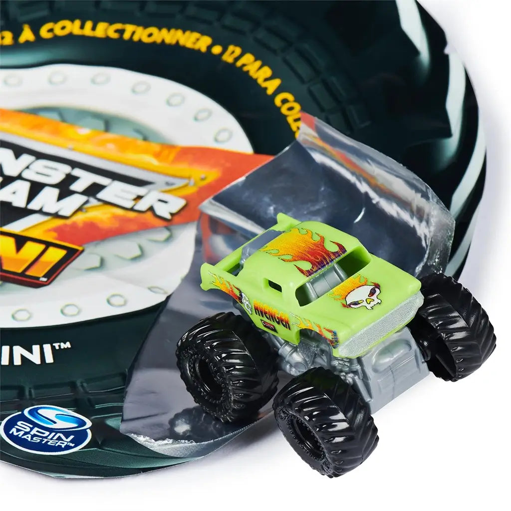 Monster Jam Avenger mini truck in lime green die-cast body with flame graphics and skull decal, compact pickup shape on large black rubber tires, positioned next to packaging on a white background.