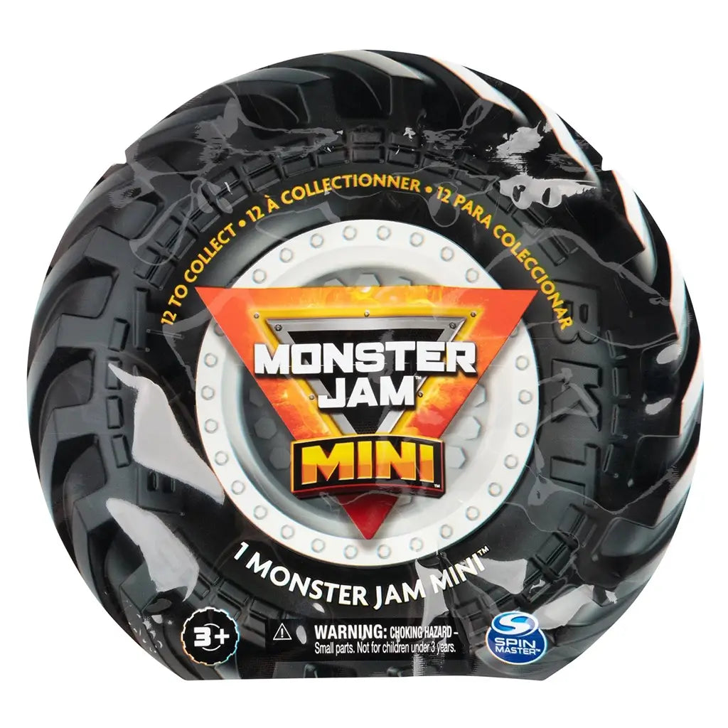 Monster Jam Mini mystery package shaped like a black tire with molded rubber texture, circular form featuring bold logo graphics and warning text, presented against a clean white background.