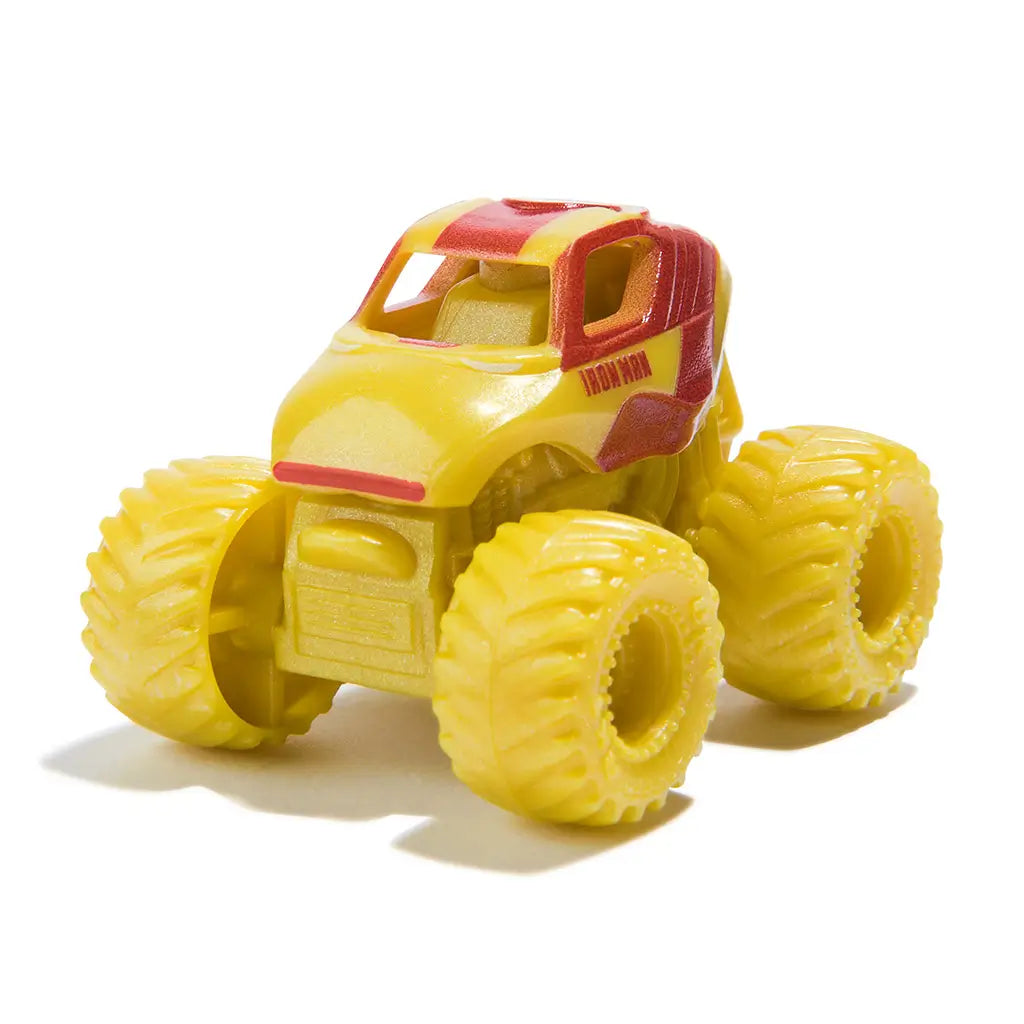 Iron Man Monster Jam mini truck in yellow and red plastic with oversized textured tires, compact lifted body style for action stunt play, displayed isolated on a clean white studio background