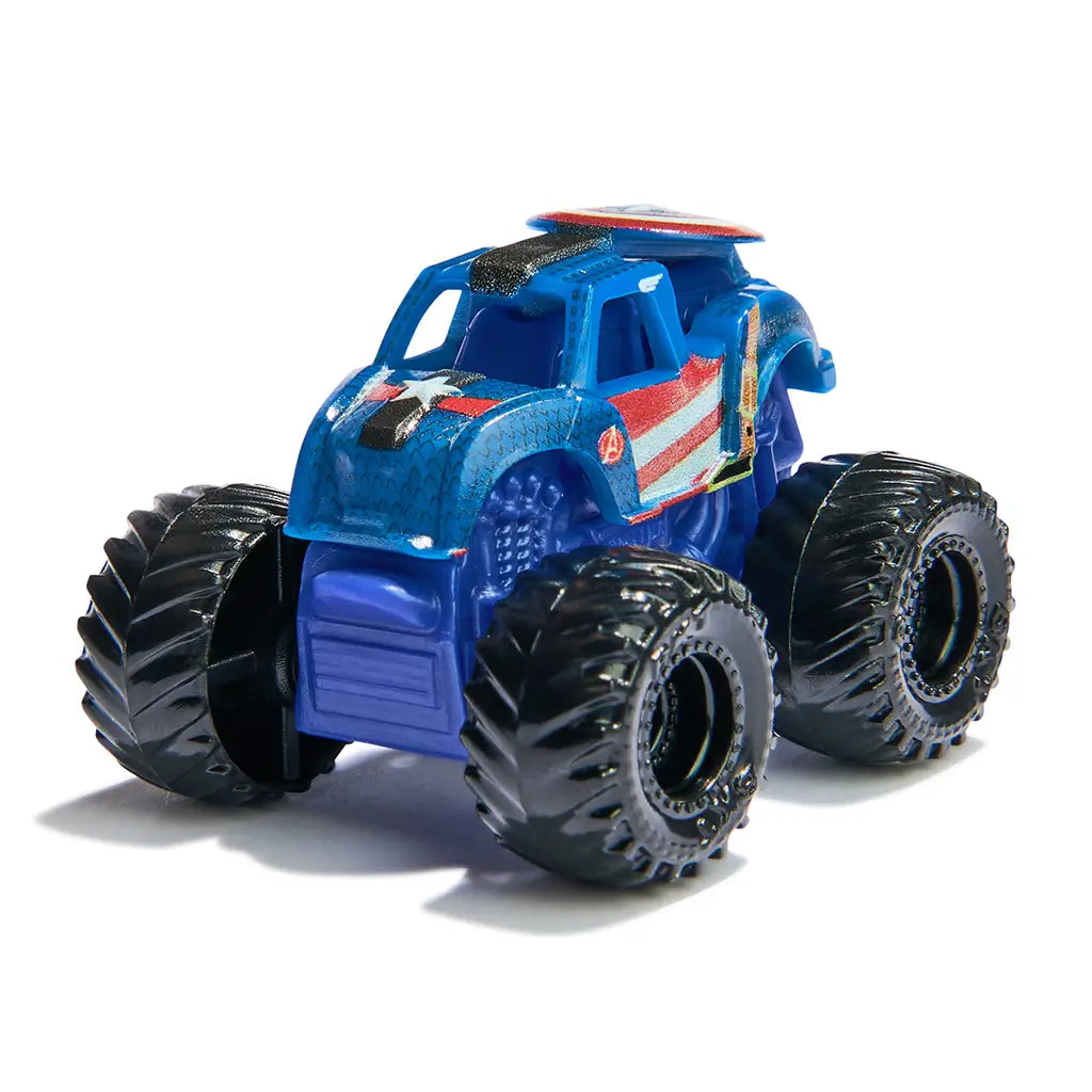 Monster Jam Captain America mini truck in blue plastic with red and white shield graphics, chunky oversized black wheels, compact monster truck form designed for play, displayed on a clean white background.