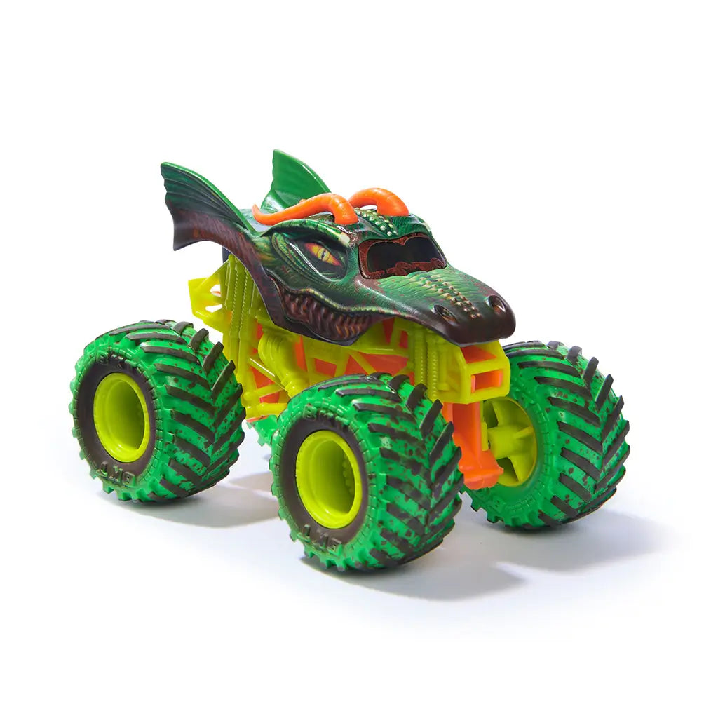 Monster Jam Dragon toy truck in green and orange plastic with textured scales and horned dragon head shape, oversized treaded tires, front angled view designed for play, isolated on a clean white background