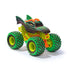 Monster Jam Dragon toy truck in green and orange plastic with textured scales and horned dragon head shape, oversized treaded tires, front angled view designed for play, isolated on a clean white background