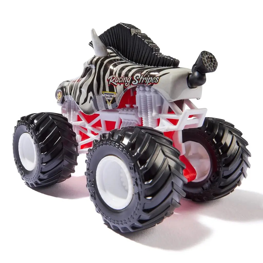 Rear angled view of Monster Jam Racing Stripes diecast monster truck, showing zebra-patterned body, red undercarriage, white frame, and large tread tires.