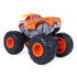 Monster Jam El Toro Loco Rev ’n Roar monster truck in orange plastic with flame graphics and large black tires, shown from a rear angled view to highlight suspension details, chassis structure, and rugged off-road styling.