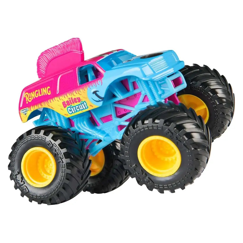 Blue and pink Monster Jam Ringling Bailey Circuit toy truck with detailed plastic frame, oversized black tires with yellow centers, captured in dynamic angled pose on plain white background.