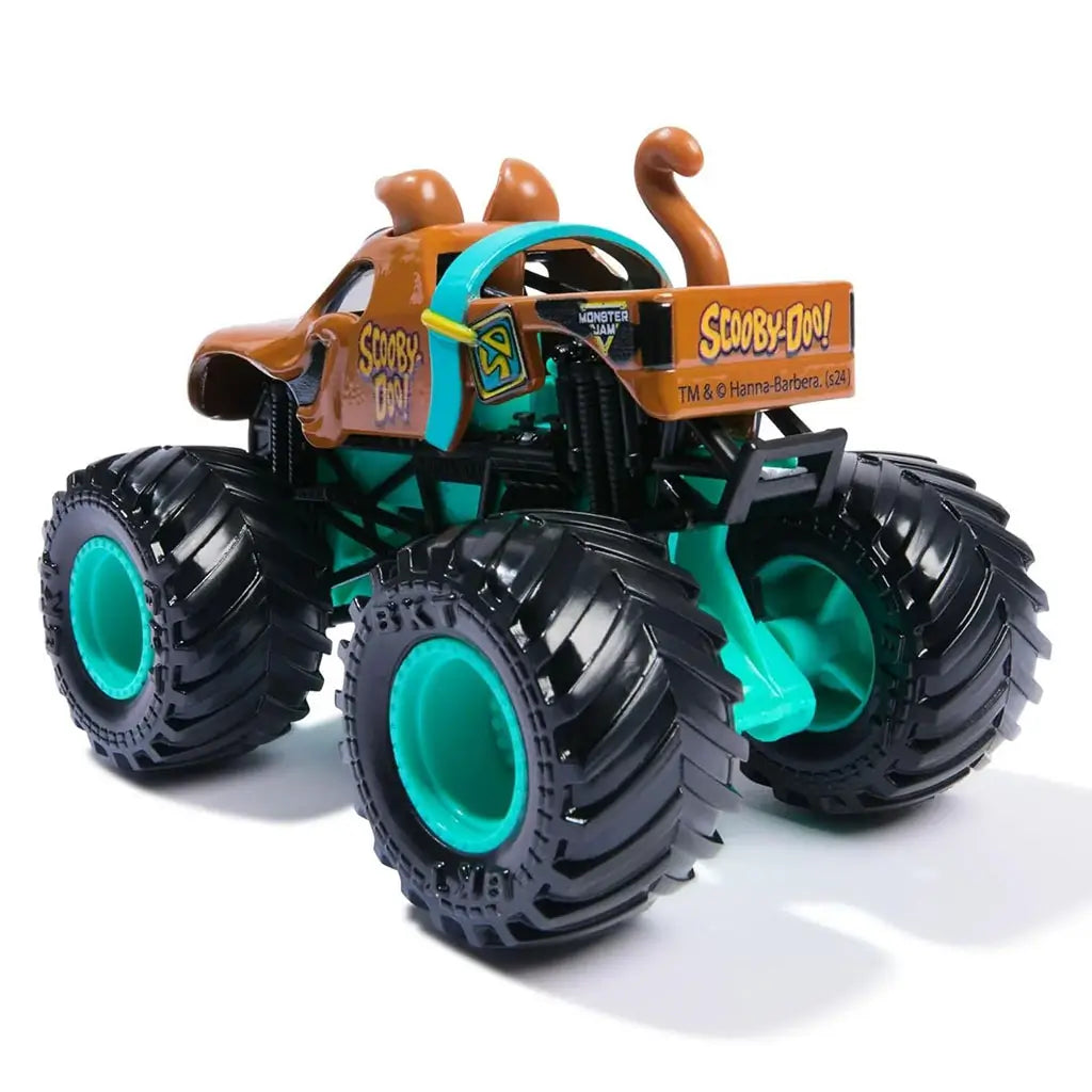Monster Jam Scooby-Doo toy truck rear angled view with brown dog-themed body, teal chassis, oversized black tires, teal rims, and playful tail and ears sculpted for character design.