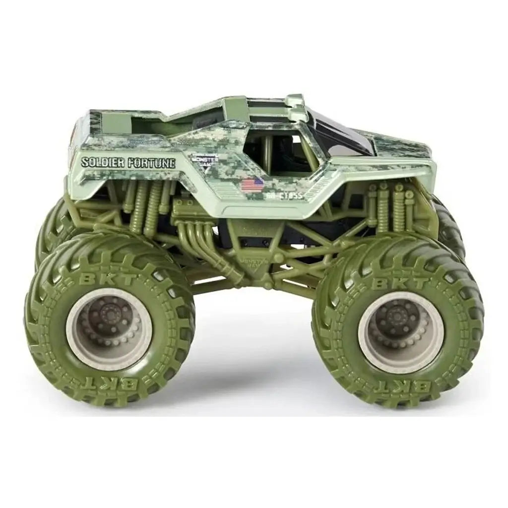 Monster Jam Soldier Fortune toy truck in green camouflage with oversized BKT tires, rugged frame, and military-inspired detailing displayed against a white background.