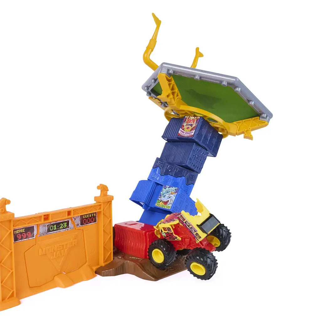 Monster Jam classroom crasher tower made of blue, red, and yellow molded plastic blocks with a tipping platform on top, designed to collapse as a monster truck crashes through the stacked structure.