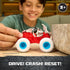 Monster Jam Monster Mutt Dalmatian toy truck red plastic body with white spotted dog shell and blue wheels being pushed forward by a child to drive, crash, and reset on a tabletop setting