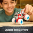 Monster Jam Monster Mutt Dalmatian toy truck red plastic frame with white spotted dog shell and blue wheels lifted by a child’s hand, demonstrating unique crash and reset play feature in indoor setting
