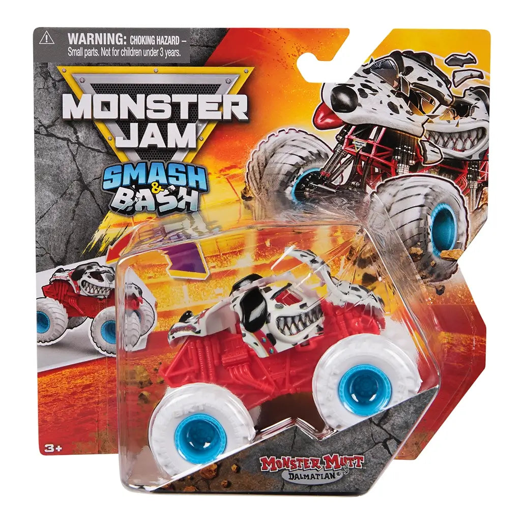 Monster Jam Smash Bash Monster Mutt Dalmatian toy truck packaging showing red truck with white spotted dog design and blue wheels in clear plastic blister on illustrated cardboard backing