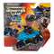 Monster Jam Son Uva Digger toy truck in teal blue plastic with black body and purple wheels, rugged oversized monster truck shape in retail packaging, displayed on branded Smash & Bash card backing.