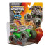 Monster Jam Zombie toy truck in green plastic with gray and red zombie-themed body, rugged monster truck shape in clear blister packaging, displayed on Smash & Bash branded retail card background.