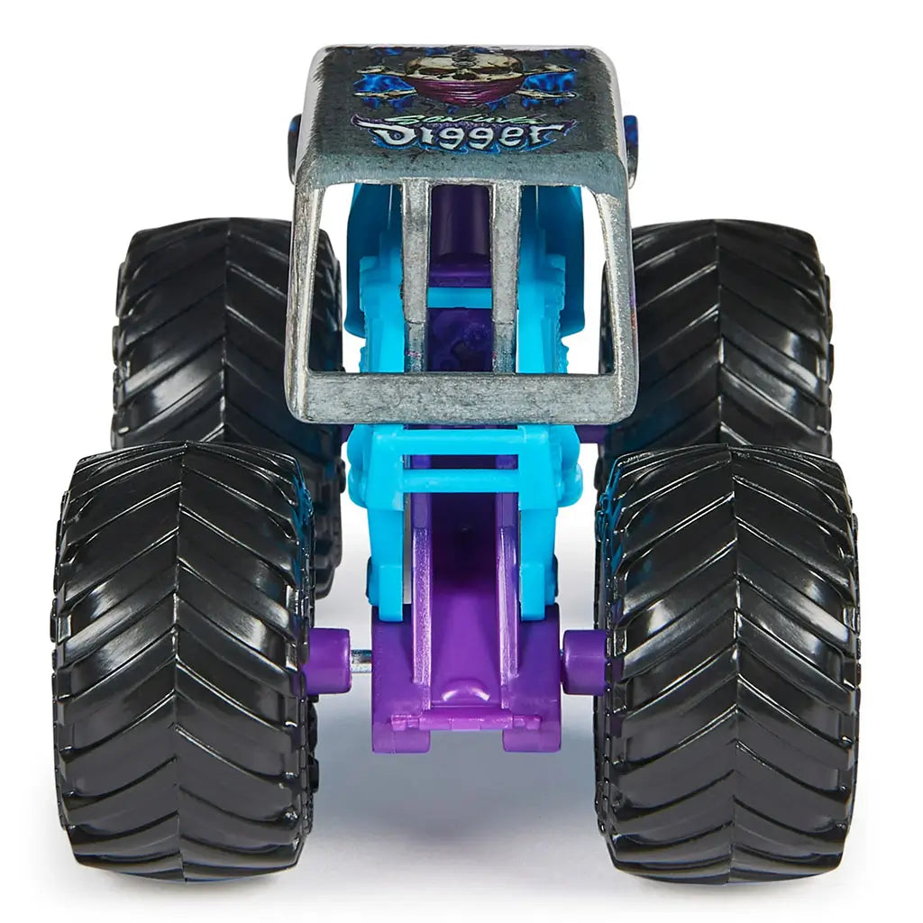 Rear view of Monster Jam Son-uva Digger 1:64 scale diecast truck, featuring massive treaded black tires, blue chassis, and silver roof with skull artwork.