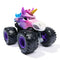 Monster Jam Sparkle Smash Legacy 1:64 scale toy monster truck front angled view with fierce unicorn face, bright colors, giant black tread tires, and purple wheel rims.