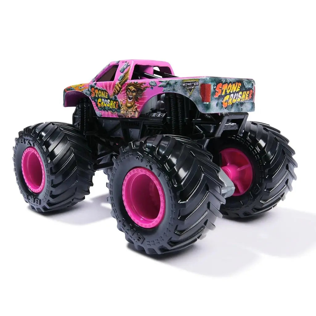 Rear angled view of Monster Jam Stone Crusher Danger Divas edition truck in hot pink with black tires, pink hubs, bold graphics, and raised frame built for stunts and off-road play.