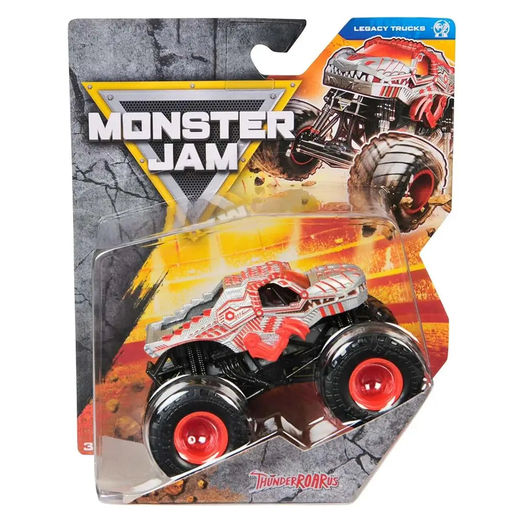 Monster Jam ThunderROARus toy truck in silver and red with scaly metallic texture and bold graphics, sealed in clear blister packaging against a fiery arena backdrop emphasizing its dynamic legacy-truck theme.