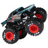Monster Jam Venom truck angled view in black and teal metal body with fang graphics, oversized rubber tires with red rims, detailed frame and suspension, on a white background.