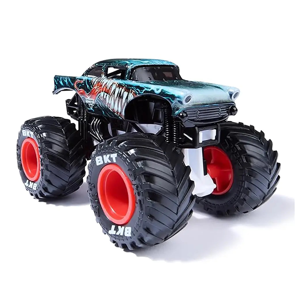 Monster Jam Venom truck toy in black and teal painted metal body with fang graphics, oversized rubber tires with red rims, rugged suspension frame, displayed on a white studio background.