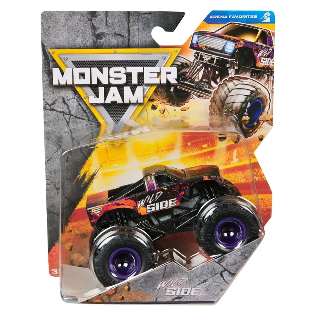 Monster Jam Wild Side toy truck in black with bright paint-splatter graphics and purple wheels, sealed in clear blister packaging against a fiery yellow arena backdrop highlighting its bold arena-favorites theme.
