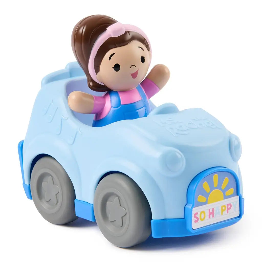 Ms. Rachel 1-2-3 Roll vehicle toddler toy in light blue molded plastic with gray wheels and smiling girl driver, rounded compact car shape, pull-back learning car isolated on a clean white background.