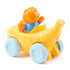 Ms. Rachel Herbie’s 1-2-3 Roll vehicle toy in bright yellow molded plastic with pale blue wheels, rounded banana-shaped rear and seated orange figure, pull-back toddler car shown from the back on a white background.