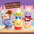 Collection of Disney Munchlings plush cupcakes featuring characters like Mickey, Stitch, Pooh, and Ursula, shown on a pastel table with a pink and purple sprinkle background and fun collectible text.