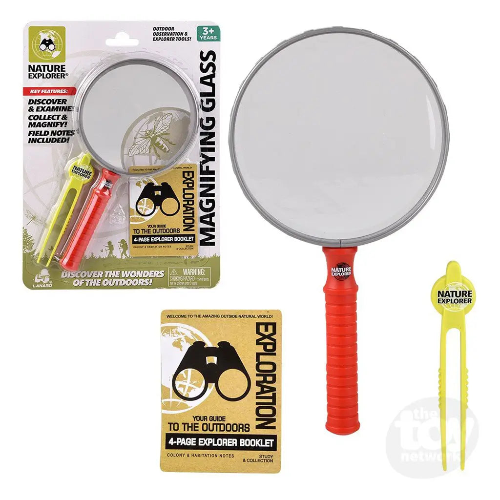 Nature Explorer magnifying glass kit featuring red-handled lens, yellow tweezers, and tan explorer booklet displayed with packaging, promoting outdoor science fun for kids ages 3 and up.