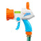 Nerf Super Soaker Quadblast water blaster featuring blue handle, white body, green chamber, and orange rotating nozzle, connected to a garden hose for continuous water play.