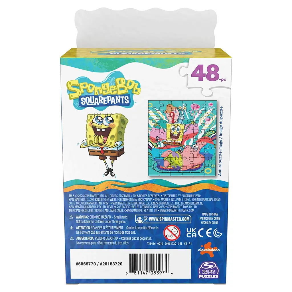 multicolor cardboard puzzle box Nickelodeon SpongeBob SquarePants, smooth printed surface with character art and product details, rectangular back view showing barcode, safety info, and puzzle preview on white background